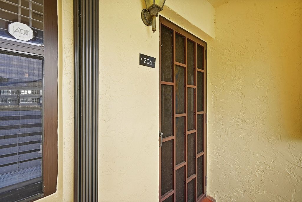 Photo of 4699 E Lucerne Lakes Boulevard #206, Lake Worth, FL 33467 (MLS # B26045797)