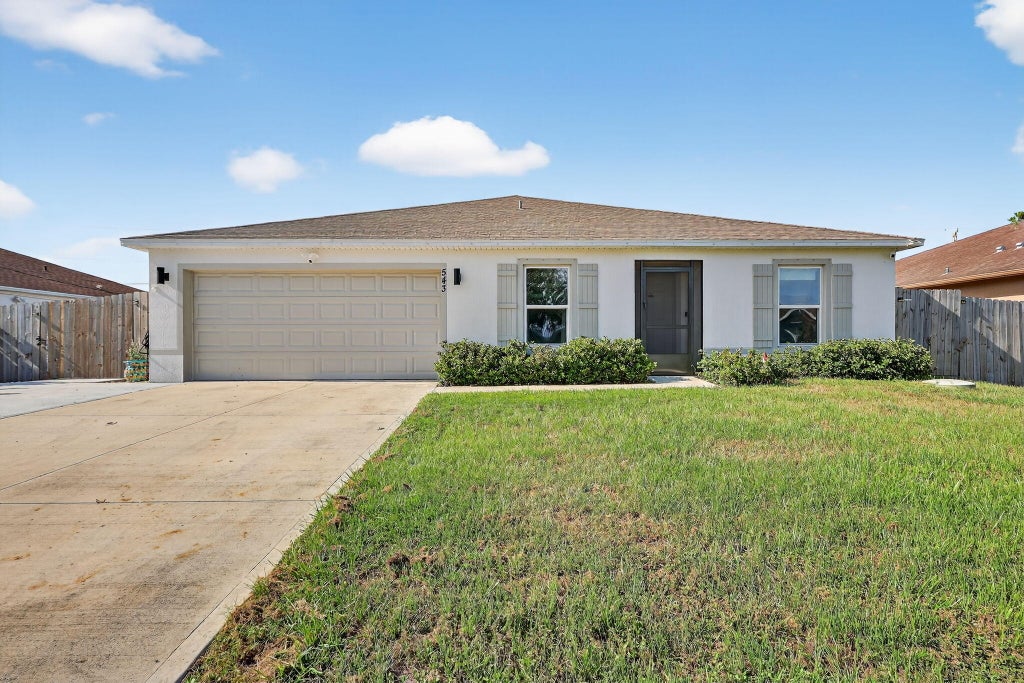 Photo of 543 SW Kabot Avenue, Port Saint Lucie, FL 34953 (MLS # B26073225)