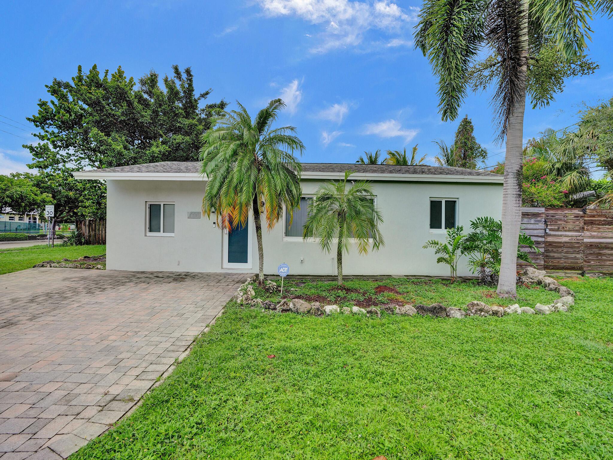 Charming neighborhood located in Oakland Park. This beautiful single family 3/2 one story home is light and bright and remodeled throughout. Featuring tile floors, spacious kitchen with stainless steel appliances and quartz countertops. Tankless water heater in designated laundry room. Shingle tile roof, paver driveway, impact windows/door, AC all 2016. Enjoy ample space in the yard with a beautiful royal poinciana ''flame tree'' which provides dappled shade in summer, with wide, spreading branches and brilliantly-colored flowers. Oakland Park's thriving downtown area offers a vibrant atmosphere with eclectic shops, trendy cafes, and a variety of cultural events. With its charming homes and proximity to parks and beaches, Collier Estates offers a delightful place to live. Must see!