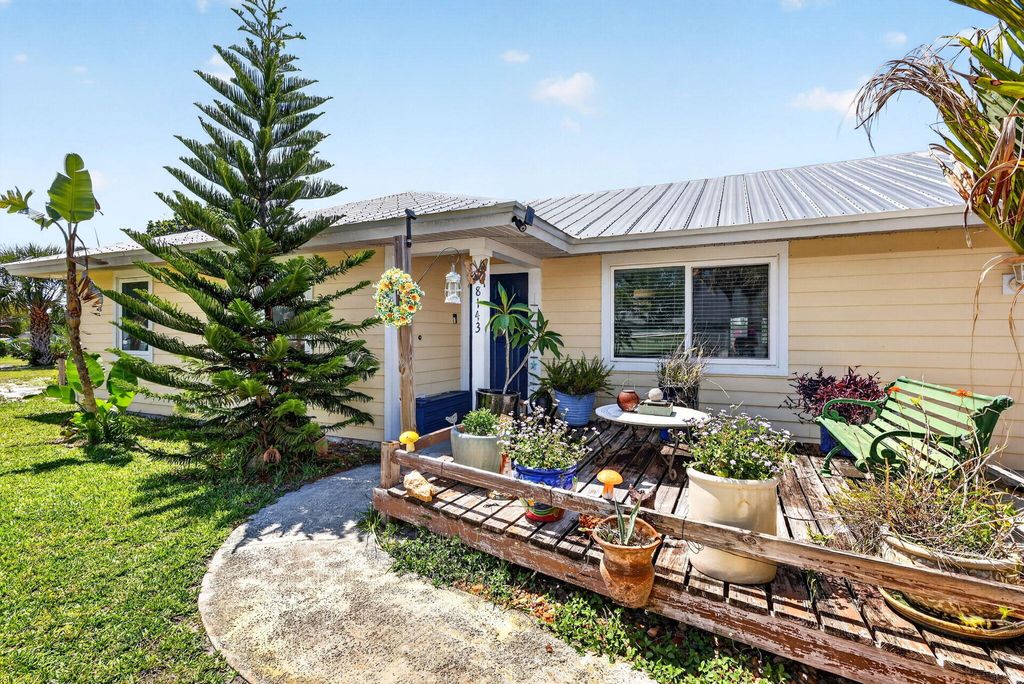 Photo of 8143 SE Woodland Road, Hobe Sound, FL 33455 (MLS # B26031143)