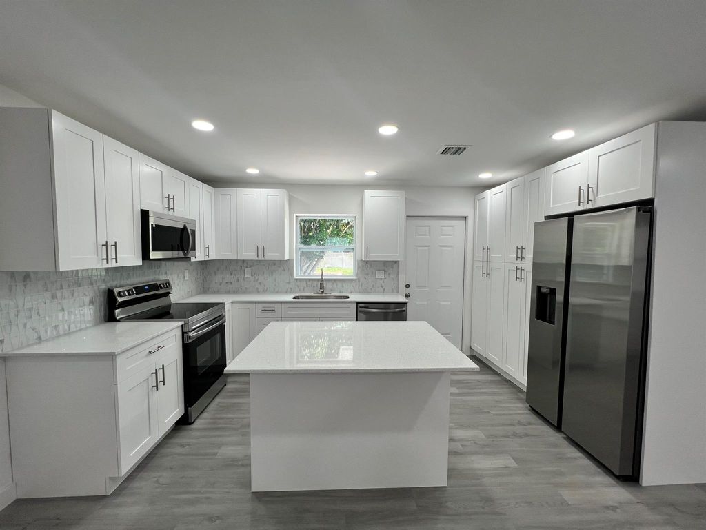 Photo of 2801 Ave Q, Fort Pierce, FL 34947 (MLS # R11125673)