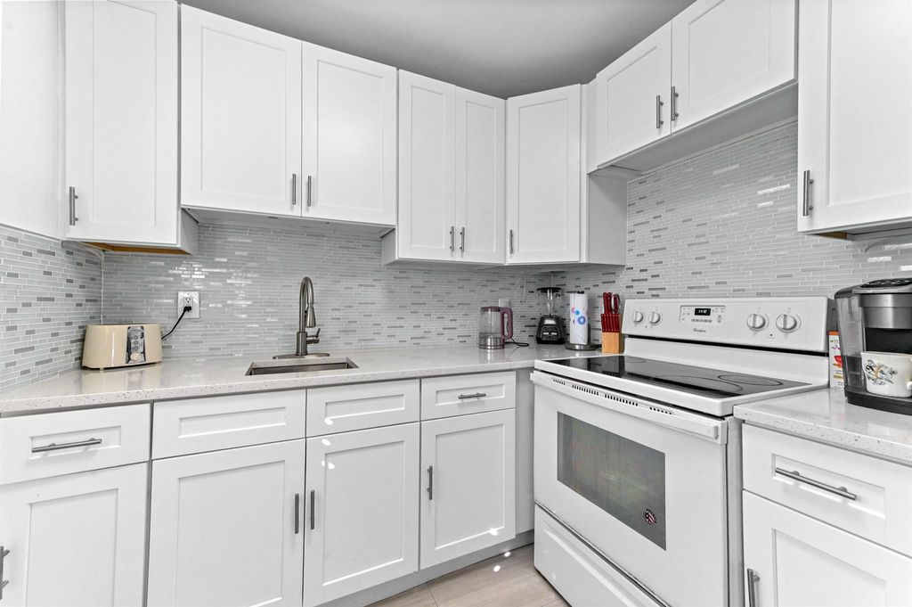 Photo of 317 Saxony G, Delray Beach, FL 33446 (MLS # R11143504)