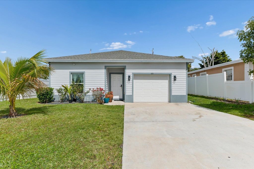 Photo of 525 NW 12th Avenue, Boynton Beach, FL 33435 (MLS # R11169881)