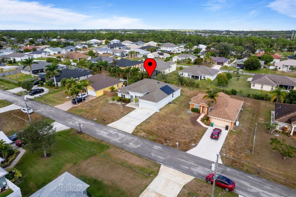 Photo of 5681 NW Croton Avenue, Port Saint Lucie, FL 34986 (MLS # R11153362)