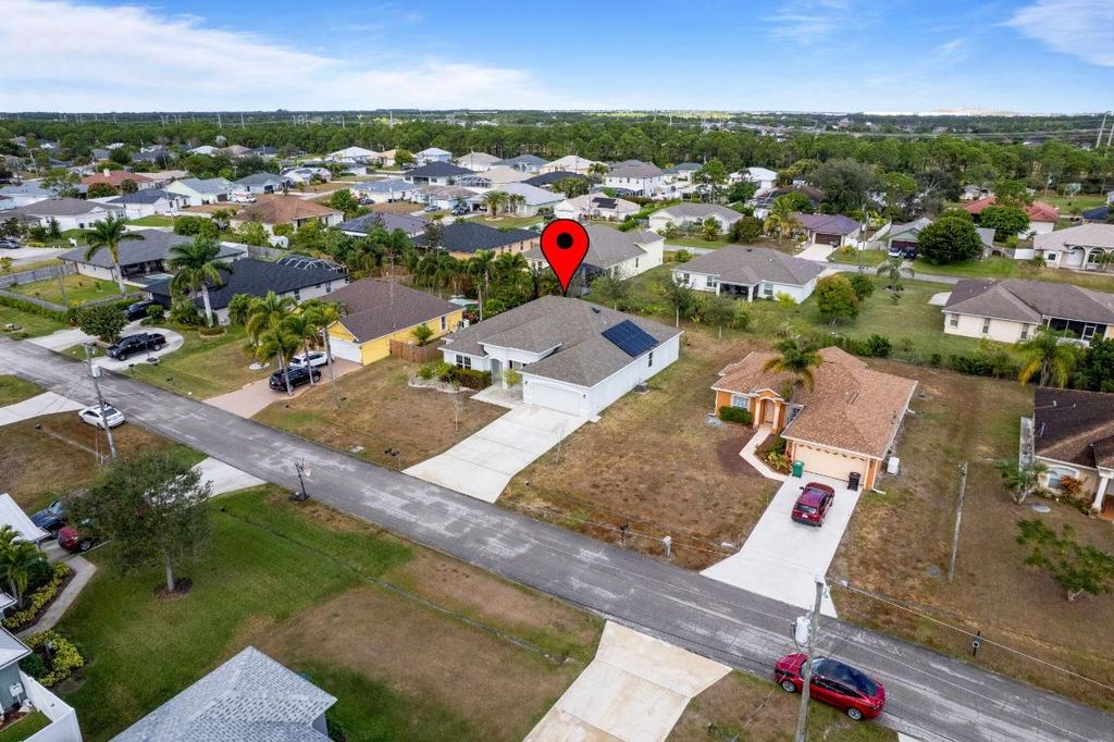 Photo of 5681 NW Croton Avenue, Port Saint Lucie, FL 34986 (MLS # R11153362)