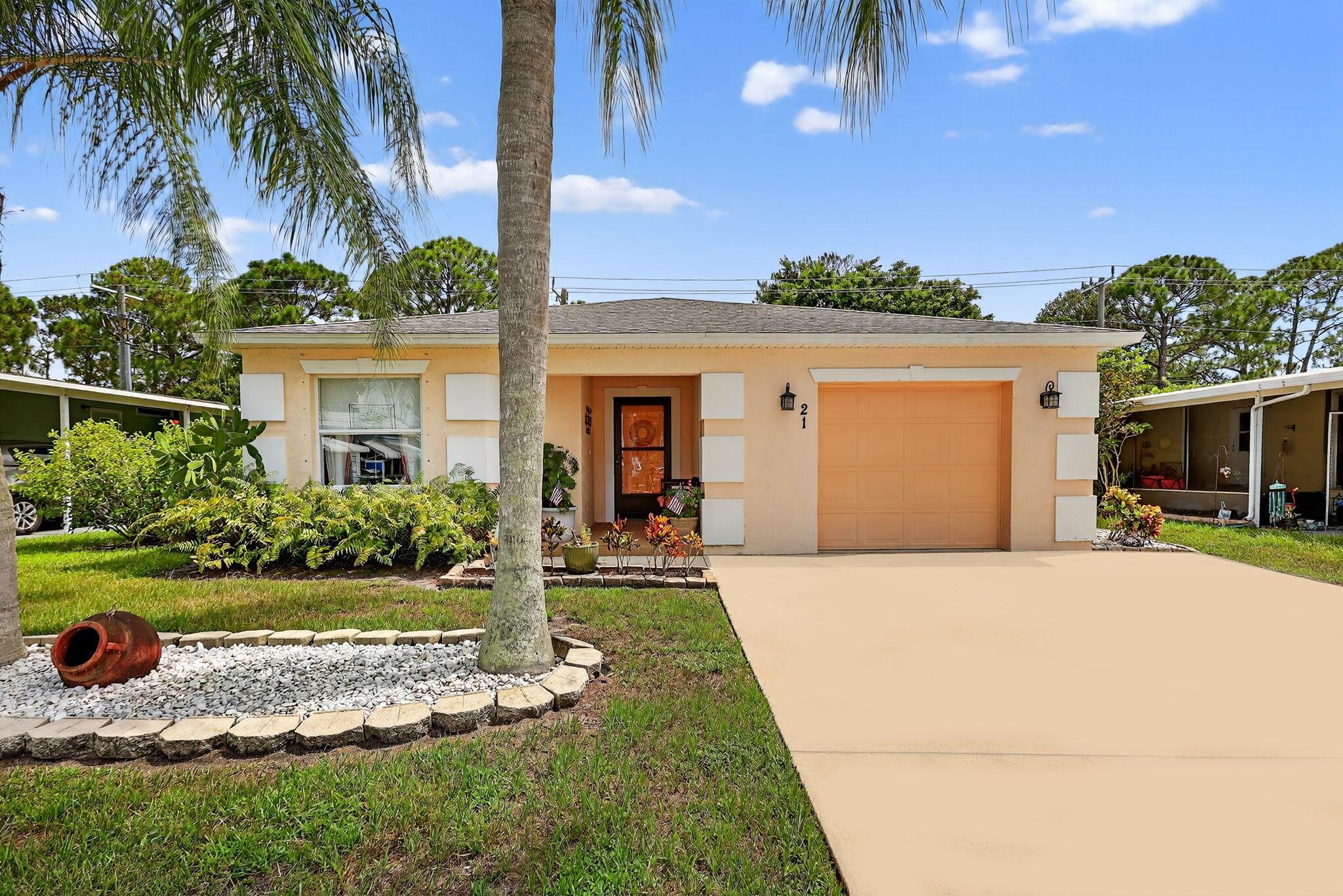 Beautiful CBS 3-bedroom, 2-bathroom home situated on a pet-friendly lot at the end of a quiet cul-de-sac in the desirable 55+ Spanish Lakes Country Club Village! Enjoy a spacious open floor plan featuring brand-new laminate flooring throughout. The large primary suite offers an en-suite bath with a generous walk-in shower, while the split floor plan provides privacy for guests. The third bedroom, located at the back of the home, boasts tranquil nature views of the private backyard. Land lease fee for next owner is $798.90 includes trash removal, lawn care & amenities. such as a private golf course with no fees to play, pickleball, tennis, shuffle board, Bocce, 2 swimming pools, fitness center, & a huge variety of social activities. You do not want to miss this home, priced right to sell