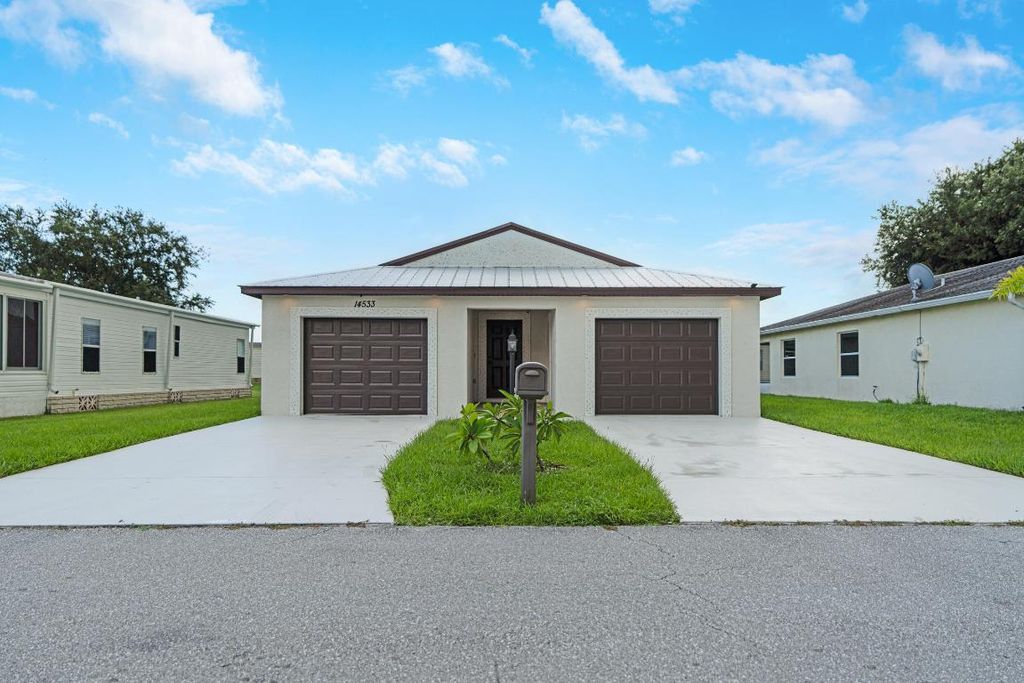 Photo of 14533 Dulce Real Real, Fort Pierce, FL 34951 (MLS # R11109375)