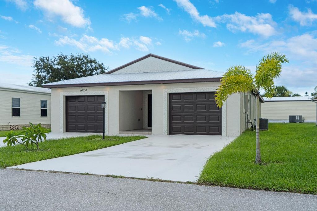 Photo of 14533 Dulce Real Real, Fort Pierce, FL 34951 (MLS # R11109375)