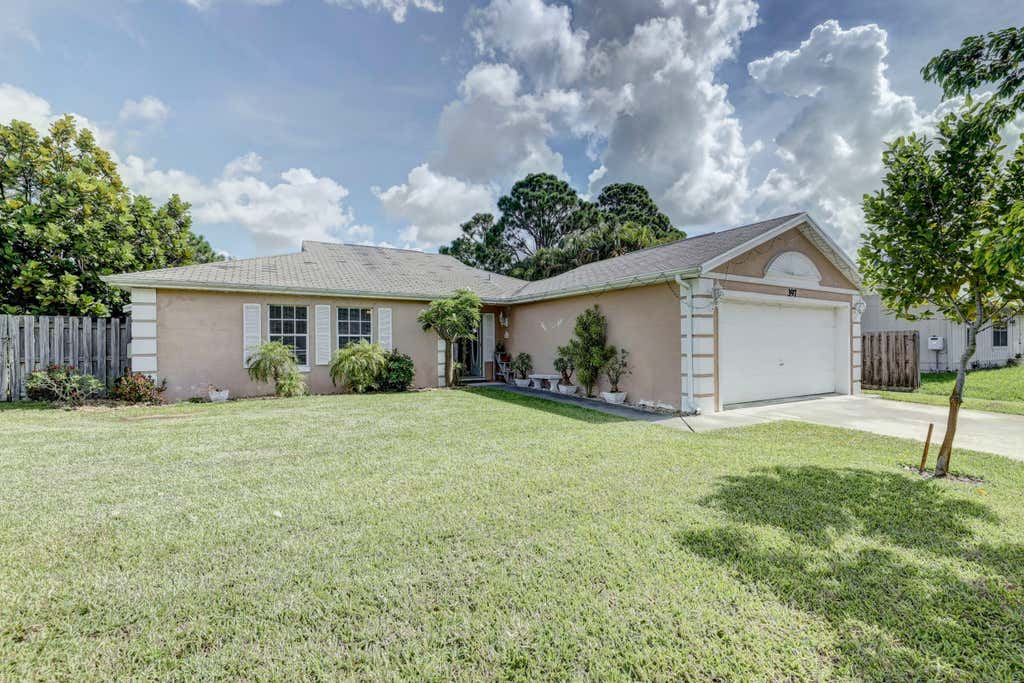 Photo of 397 SW Ray Avenue Ave, Port St Lucie, FL 34983 (MLS # R10815812)