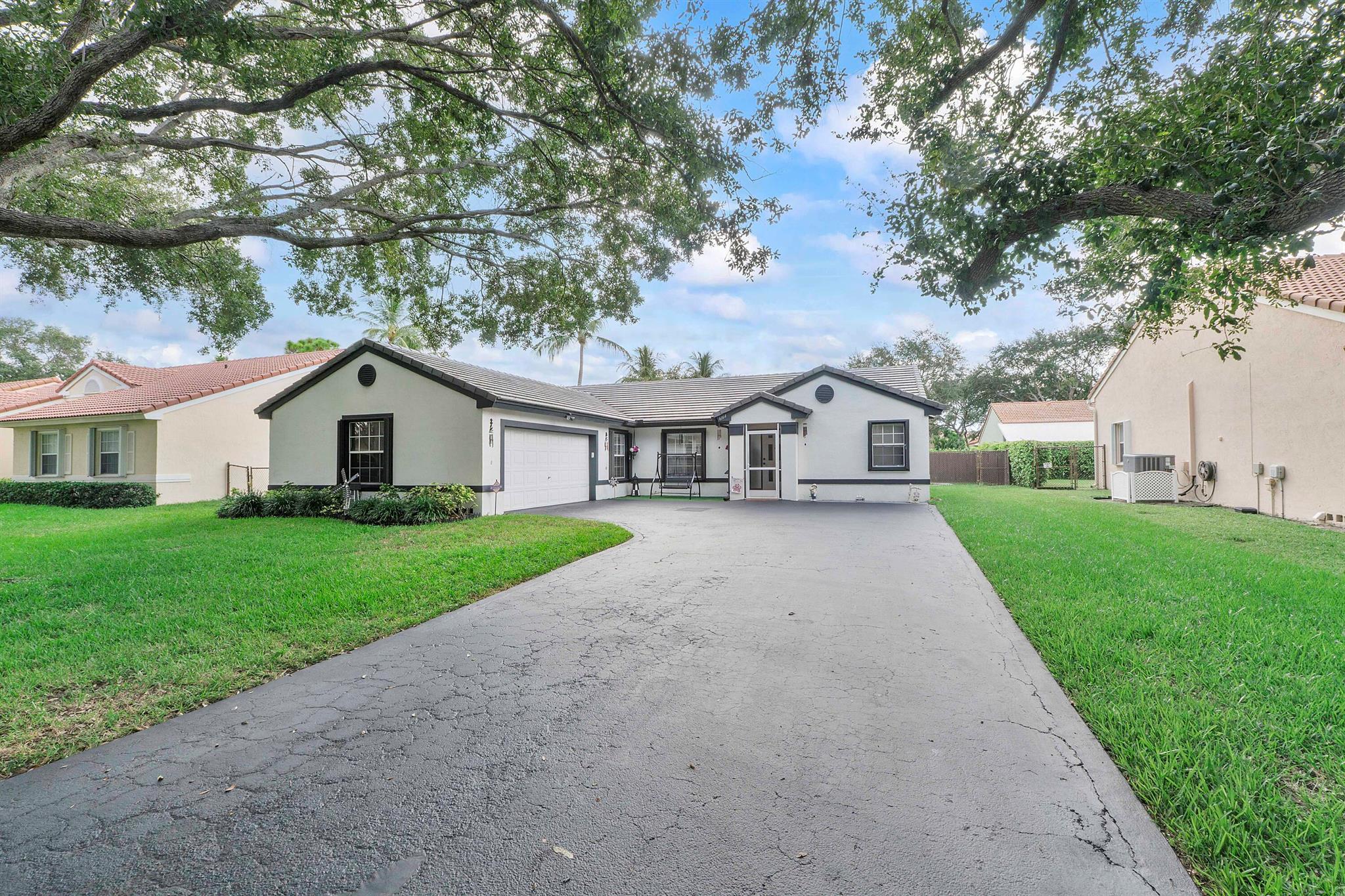 YOU WILL VIEW A HOME THATS BEEN INCREDIBLY MAINTAINED. NO RED FLAGS. H20 HEATER(2021) 40 GAL. AC 2.5 TON 2019 MAINT. RECORDS EVERY 6 MON. APPLIANCES 2015. ALARM (OWNED) EXTERIOR MOTION LIGHTING. POOL REDONE in 2017 . NEW POOL PUMP HEATED POOL.ASTRO TURF IN PRISTINE CONDITION. ALL NEW SCREENS THROUGH OUT THIS HOME. ACCORDION SHUTTERS. DRIVEWAY RECENTLY PAVED 8/08/25.TOTALLY FENCED IN YARD. FRESH PAINT. SPLIT FLOOR PLAN ...SO CLEAN!!! EASY ACCESS TO I-95 , THE TURNPIKE AND THE SAWGRASS .FIRE /POLICE SUB-STATION AND COMMUNITY CENTER MINUTES AWAY. YOU WONT FIND A QUIETER MORE FRIENDLY NEIGHBORHOOD ANYWHERE. YOU BETTER COME QUICK!!!!