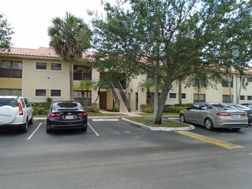 Palm Beach Grande is a non gated community located in West Palm Beach. This second floor walk up condo with lake view has two bedrooms and two bathrooms. Newer appliances in kitchen with granite countertops. Tile throughout and carpet in both bedrooms. Open covered balcony with sliding doors overlooks lake view. Accordion Hurricane Shutters on sliding door and both bedroom windows. Laundry room in building. Community includes play area, pool and tennis courts. Near major roads, shopping, highways, restaurants, beaches, parks. airport and more.
