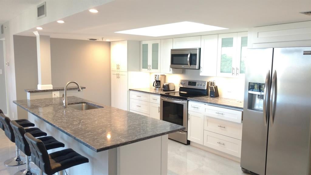 Photo of 2025 Lavers Circle #D502, Delray Beach, FL 33444 (MLS # R10695564)