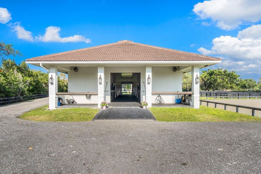 Photo of 1382 Clydesdale Avenue, Wellington, FL 33414 (MLS # B26032920)