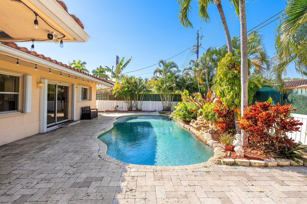 Photo of 451 NE 25th Terrace, Boca Raton, FL 33431 (MLS # R11162113)