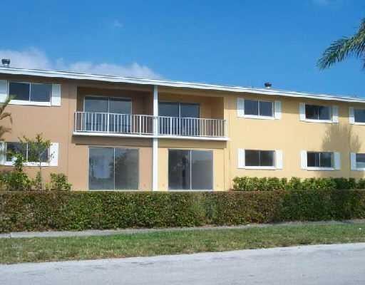 Photo of 1505 Crescent Circle #C30, Lake Park, FL 33403 (MLS # R11113461)