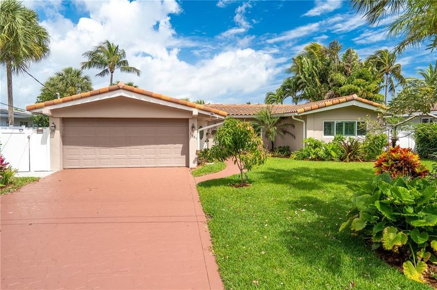 Desirable WIDE water Poinsettia Heights home features a split floor plan with 3 bedrooms 2 bath, spacious kitchen and living areas. Beautiful views with 80 feet of the south fork of the middle river and tropical landscaping. Stunning saltwater pool overlooking the water with several generous outdoor gathering spots to socialize or relax and recharge; whether under the lanai on the dock or in a hammock under swaying palms. This is a dream home with its location in Fort Lauderdale and on the water just 2 bridges to the ocean.  Impact windows, and new house gas generator 2021 (500 gallon propane tank buried) AC 2018 and roof 2015, dock and boat lift 2017-2018.Garage has custom cabinets with epoxy floor and AC. SO MUCH MORE TO OFFER, WILL GO FAST.