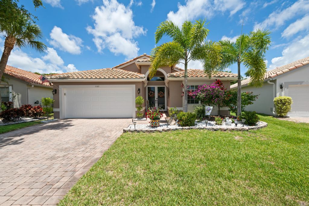 Photo of 5185 Glenville Drive, Boynton Beach, FL 33437 (MLS # B26032802)