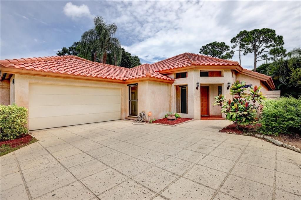 Photo of 2868 SW Mariposa Cir, Palm City, FL 34990 (MLS # F10292517)