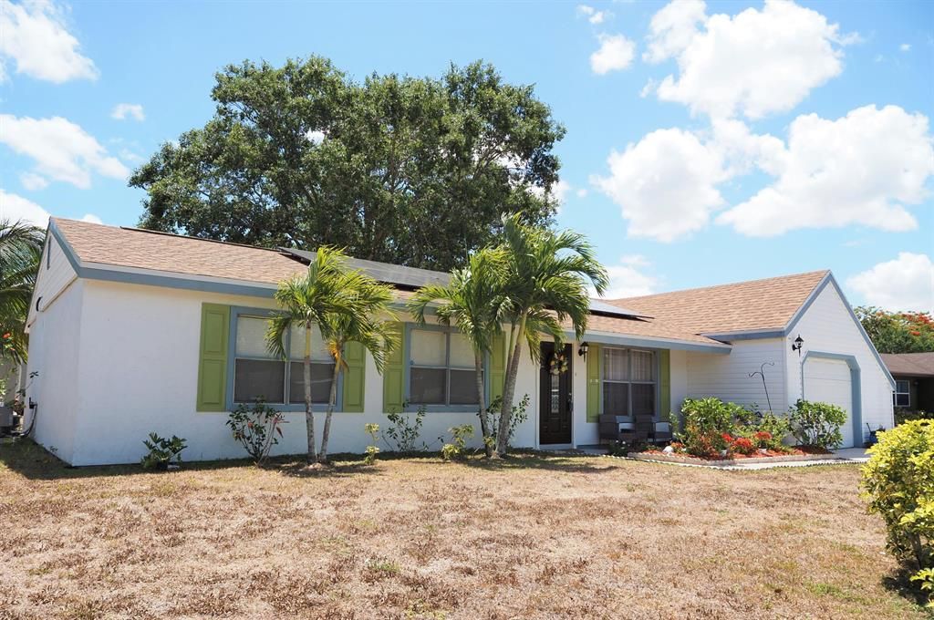 Photo of 219 SW Homeland Road, Port Saint Lucie, FL 34953 (MLS # R10799440)