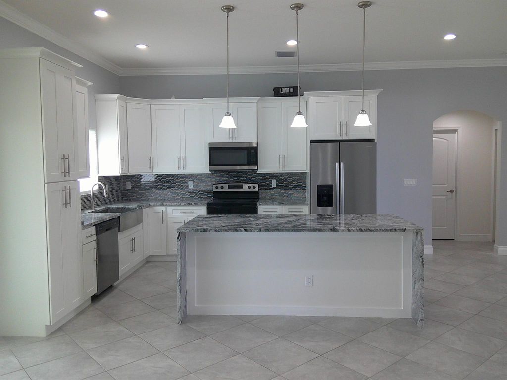 Photo of 310 SW Becker Road, Port Saint Lucie, FL 34953 (MLS # R11122205)