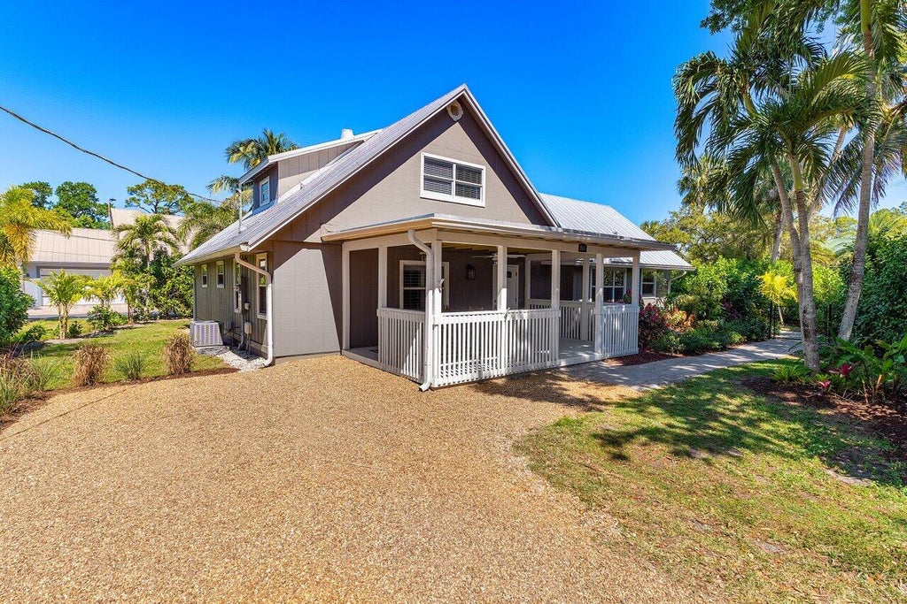 Photo of 936 SW Rustic Circle, Stuart, FL 34997 (MLS # R11071415)