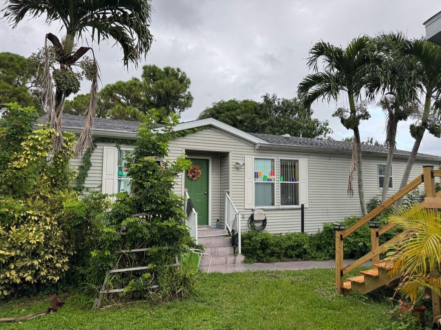 Charming mobile home featuring 3 bedrooms, 2 bathrooms,  All age,spacious kitchen with several cabinets, laundry room, and a spacious, breezy porch perfect for relaxing.Located in a community '' The Meadows ''  with amazing amenities: playground, BBQ area, gym, pool, basketball court, and clubhouse -- all just steps away! Enjoy its prime location, close to the PGA Mall, university, public transportation, and only minutes from the beach. Includes parking for 2 cars. All measurements are approximate. Call the listing agent today to schedule your showing! Don't miss the chance to live comfortably with the best lake view in the community!
