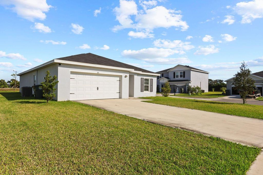 Photo of 185 Dabou Loop, Belle Glade, FL 33430 (MLS # R11146033)