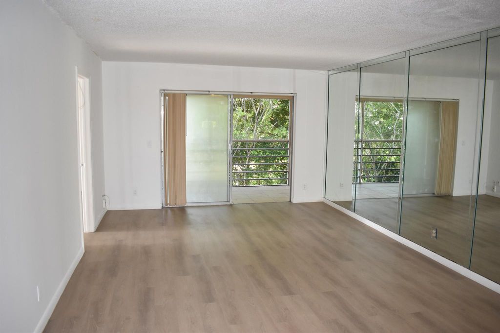 Photo of 1638 Embassy Drive #401, West Palm Beach, FL 33401 (MLS # R10902932)