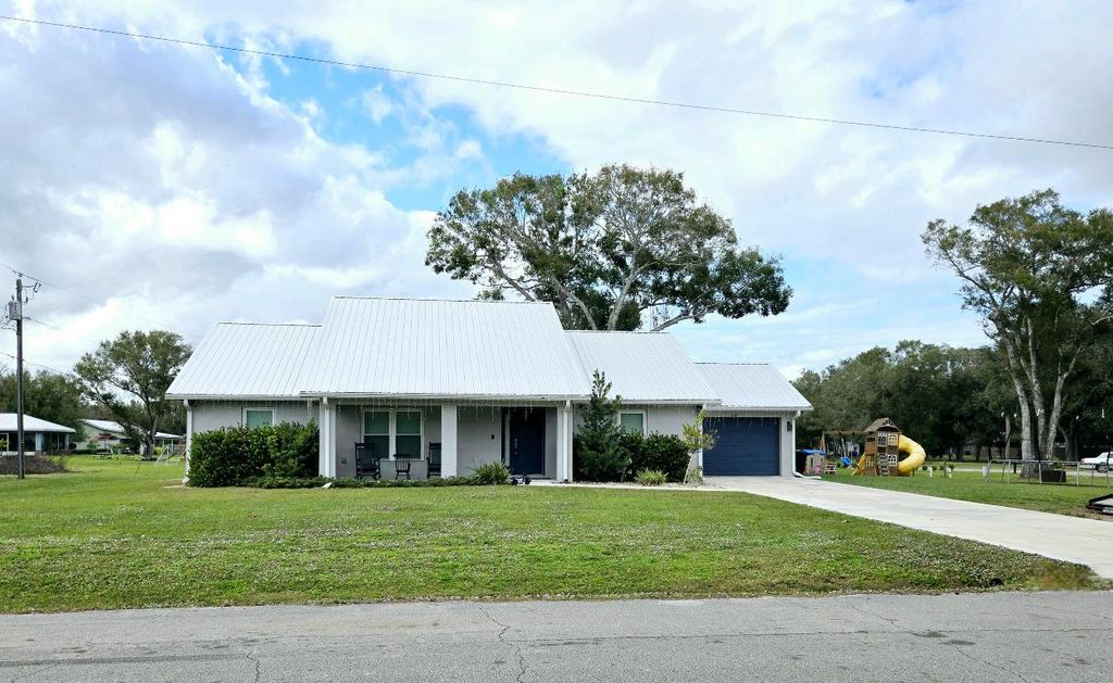 Photo of 603 NW 11th Avenue, Okeechobee, FL 34972 (MLS # R11146557)