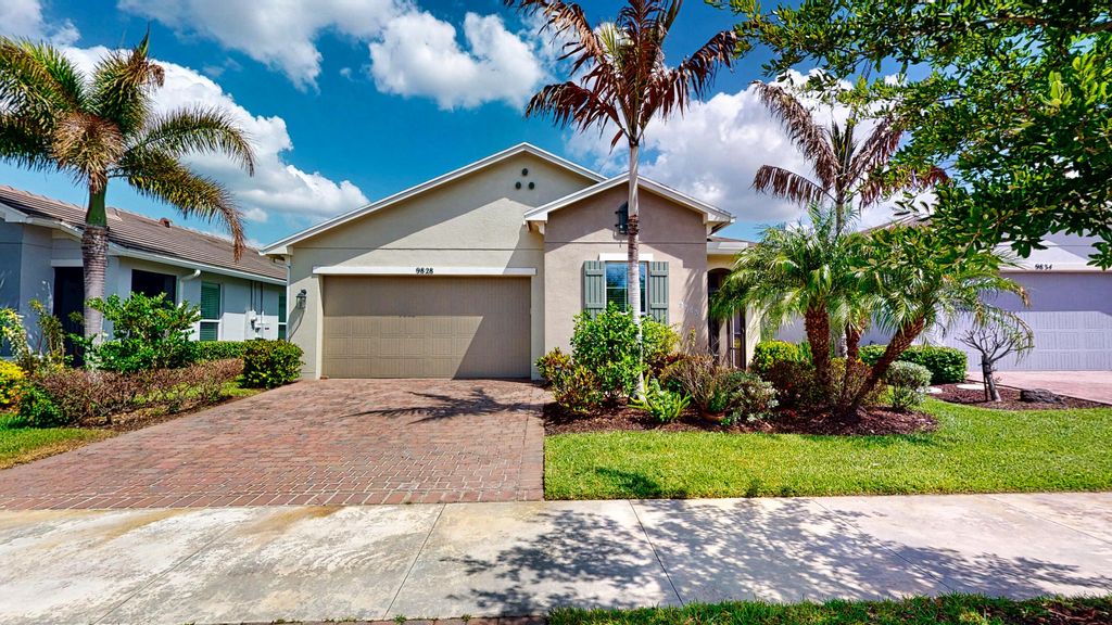 Photo of 9828 SW Trumpet Tree Circle, Port Saint Lucie, FL 34987 (MLS # B26022666)