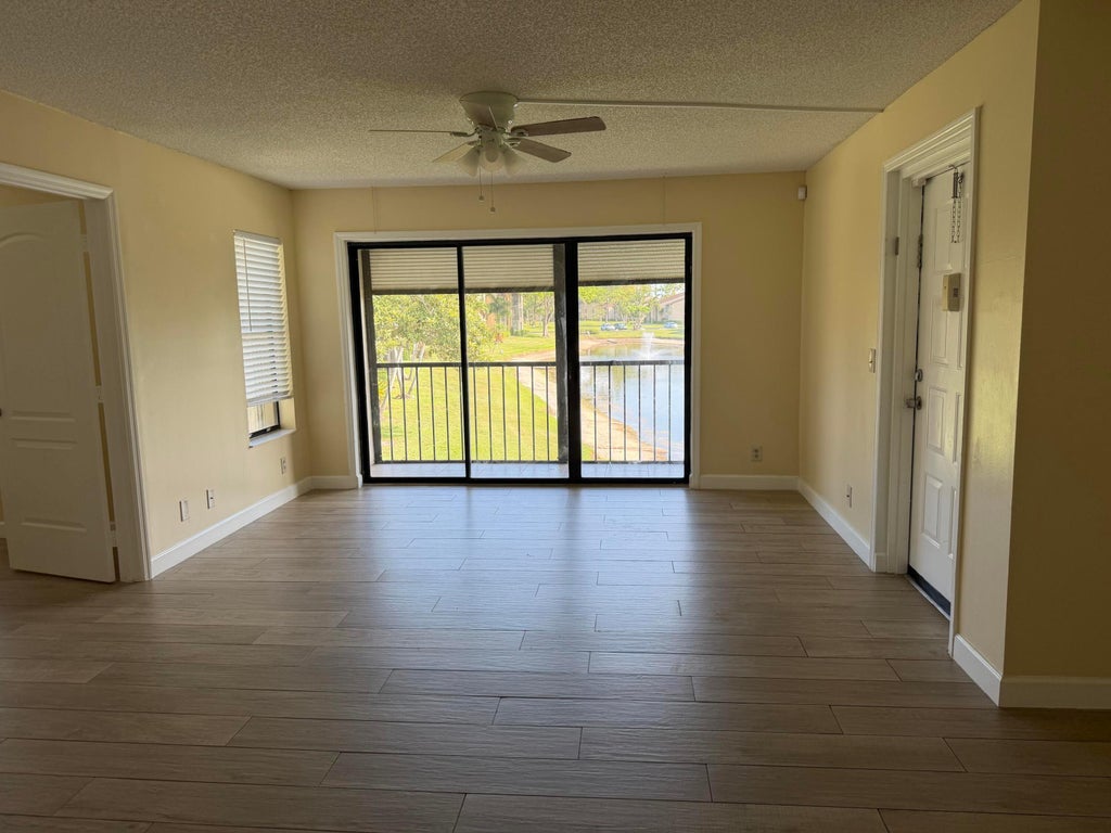 Photo of 726 Sunny Pine Way #B2, Greenacres, FL 33415 (MLS # B26041402)