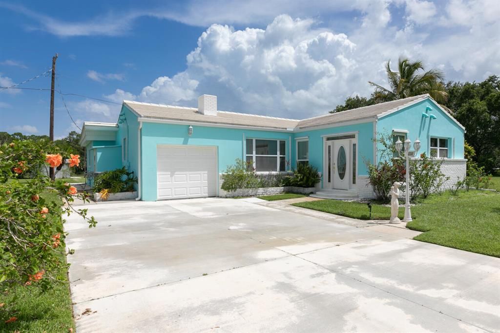 Photo of 2232 SW Canal Street, Stuart, FL 34997 (MLS # R10817984)