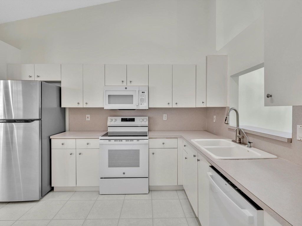 Photo of 6094 Lake Hibiscus Drive, Delray Beach, FL 33484 (MLS # R10978247)