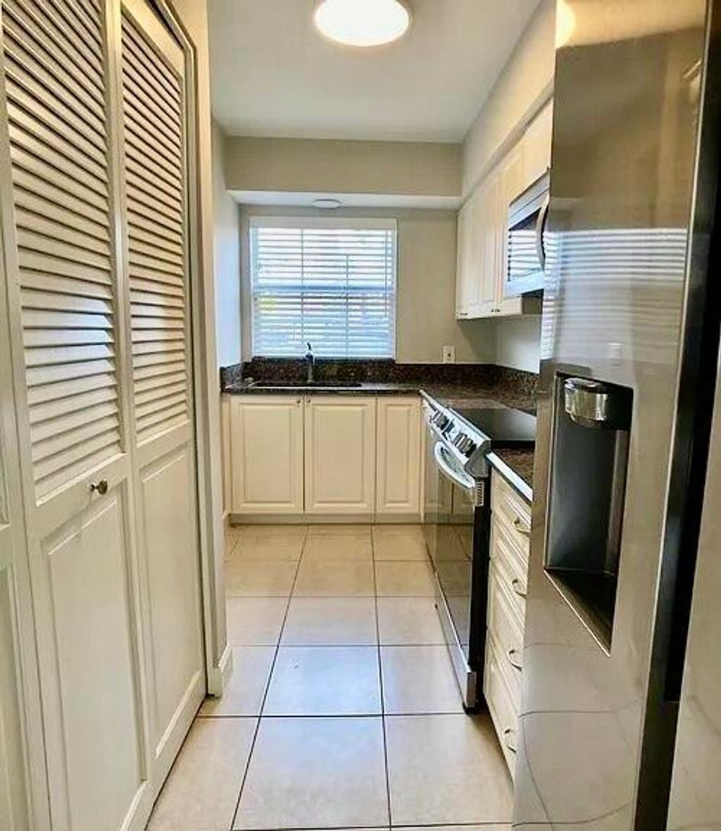 Photo of 413 N Cypress Drive #4, Tequesta, FL 33469 (MLS # R11150065)