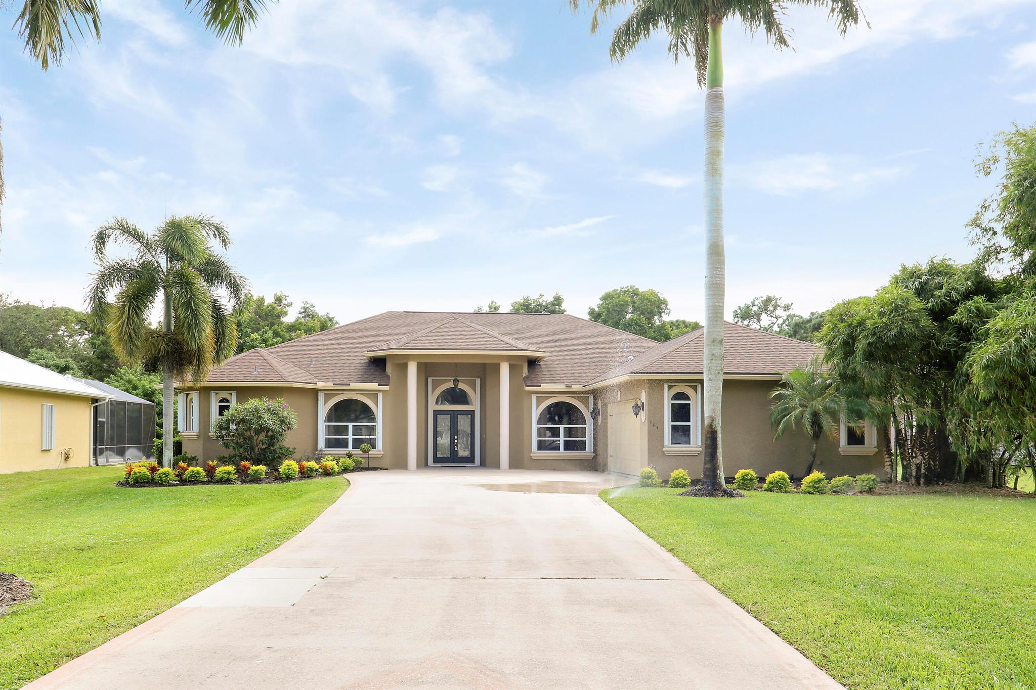 Spectacular home in the Osprey Ridge, a small, quiet gated community of only 34 homes within the Southbend area of Port St Lucie. This 4 bedroom, 3 1/5 bath home on an estate sized lot of .59AC backs to a preserve for privacy. Gourmet Kitchen, double wall oven, wooden 42'' cabinets with granite counters and a large walk-in pantry. Wet bar and wine fridge just off the dining room leading into the family room. Primary Suite includes California walk in closet, bath with dual sinks and huge wrap around counter with a spacious walk-in shower. Large, screened patio with cabana bathroom. Plenty of room for pool, if desired. The neighborhood (with Low HOA fees) runs along the St Lucie C-24 canal with ocean access and public boat ramp close by. New Roof & Full Accordion Shutters in 2021.