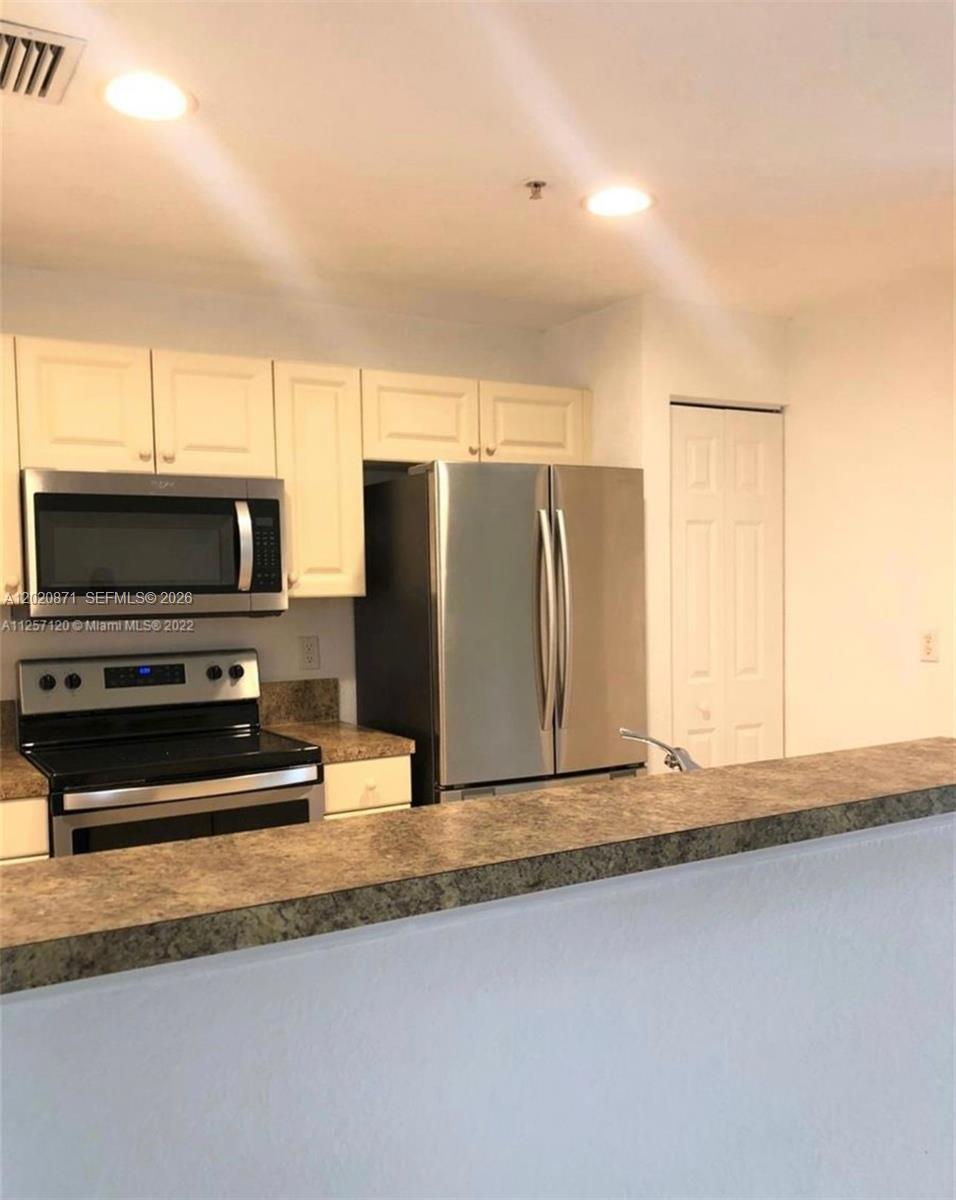 Photo of 1971 Freeport Lane #4915, Riviera Beach, FL 33404 (MLS # A12020871)