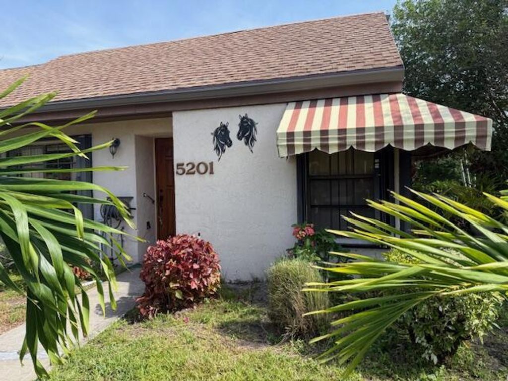 Photo of 5201 Spice Drive, Palm Beach Gardens, FL 33418 (MLS # R11091589)