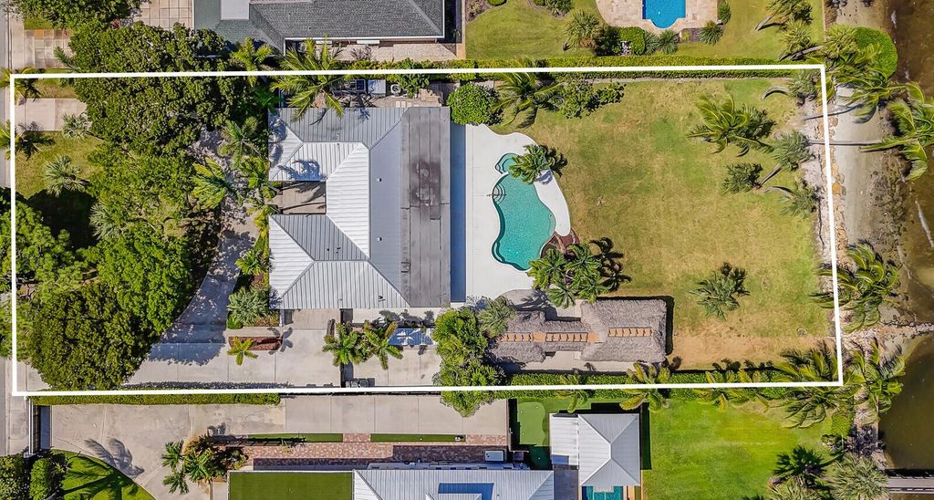 Photo of 930 S Lakeside Drive, Lake Worth Beach, FL 33460 (MLS # R11112635)