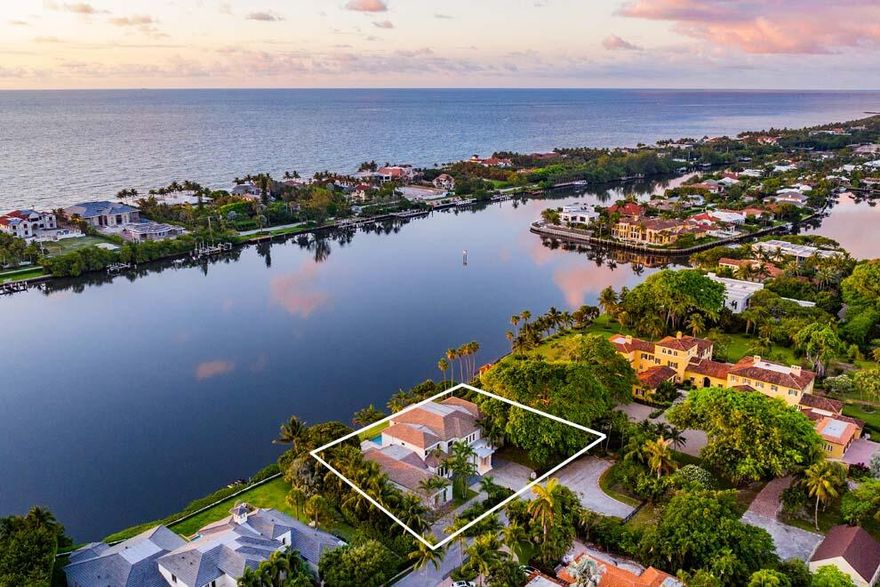 Introducing 1540 Paslay Place, a stunning, like-new estate located in one of the most sought-after locations in south Florida; Manalapan, FL. Located at the end of a private cul-de-sac, this elegant, contemporary masterpiece was built and designed by Cudmore Builders and Randall Stofft Architects.  Boasting over 180' of waterfrontage and over 10,000 total square feet, this 5-bedroom home offers a spacious, open floor plan that seamlessly integrates indoor/outdoor living, soaring ceilings and breathtaking views. Highlights include outdoor lounging and dining areas, expansive saltwater pool and spa, Miele and Thermador appliances, club room, library, office, media room, elevator, summer kitchen and 4-car garage. Do not miss the opportunity to own one of the most amazing homes in S. Florida. - Membership to the La Coquille Club
- Thermador range, refrigerator and freezer
- Miele oven, microwave, coffee machine and warming drawer 
- 1,000-gallon propane tank
- Backlit honey onyx bar top in club room
- Club Room with mini fridge and ice maker
- Due chateau wood floors 
- Marble floors
- Porcelain floors
- Control 4 system
- Exterior cameras  
- Alarm system 
- Central vac 
- 4-car garage 
- Electric shades
- 40'+ pool 7' deep
- Marble exterior floors 
- Pocket sliders
- Elevator 
- Upstairs and downstairs laundry
- Upstairs morning bar
- Gym/study in master
- Concrete second floor 
- High ceilings throughout 
- Wood floors in all bedrooms
- Natural rip wrap sea wall 
- Generator 
- Summer kitchen w grill and griddle