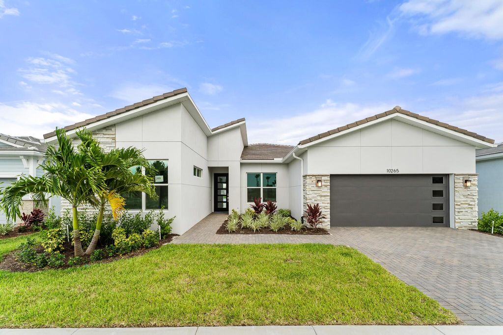 Photo of 10265 SW Carnelian Street, Port Saint Lucie, FL 34987 (MLS # R11109613)