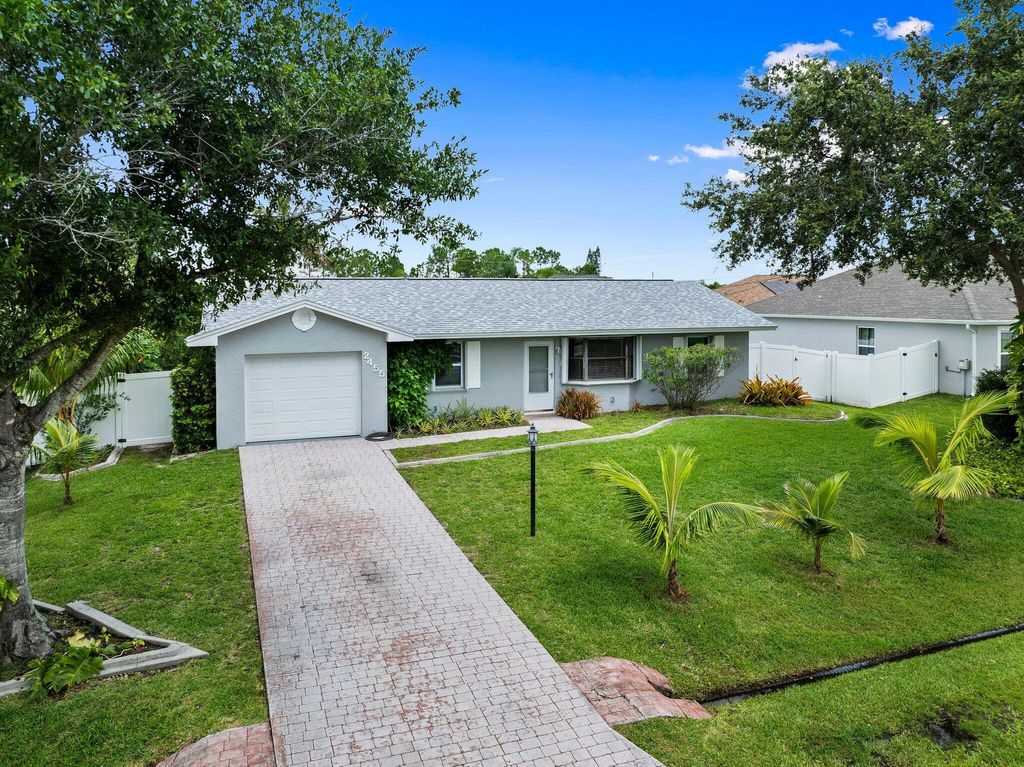 Photo of 2455 SW Datura Avenue, Port Saint Lucie, FL 34953 (MLS # R11097673)
