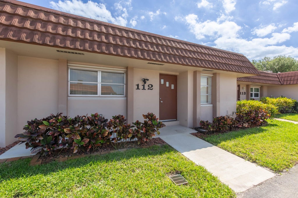 Photo of 5775 Fernley Drive W #Apt 112, West Palm Beach, FL 33415 (MLS # R10974885)