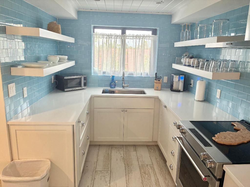 Photo of 420 Celestial Way #303, Juno Beach, FL 33408 (MLS # R11156815)