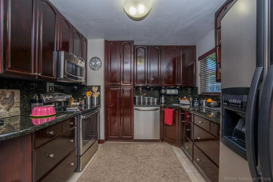 Welcome home! This charming home is just steps away from beautiful Lake Osborne is situated on an expansive lot with a lovely pool and custom built sauna! Come inside and be greeted by neutral tile throughout the living areas. The inviting kitchen has been flawlessly updated with wood cabinetry, newer stainless steel appliances and gorgeous granite counter tops! This home also offers an expansive family room, along with a large, enclosed storage area. The master bedroom is spacious and comes complete with a master bathroom which is titled from floor to ceiling, has a beautiful Roman tub and granite counter tops! Very centrally located in a desirable Lake Worth neighborhood with NO HOA this home is just minutes to I-95, the Turnpike, Downtown West Palm Beach, area beaches, Wellington, Boynton Beach, 3 international airports this home is very convenient!