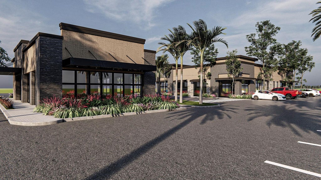 Photo of 7240 W COMMERCIAL Boulevard, Lauderhill, FL 33319 (MLS # B26083103)