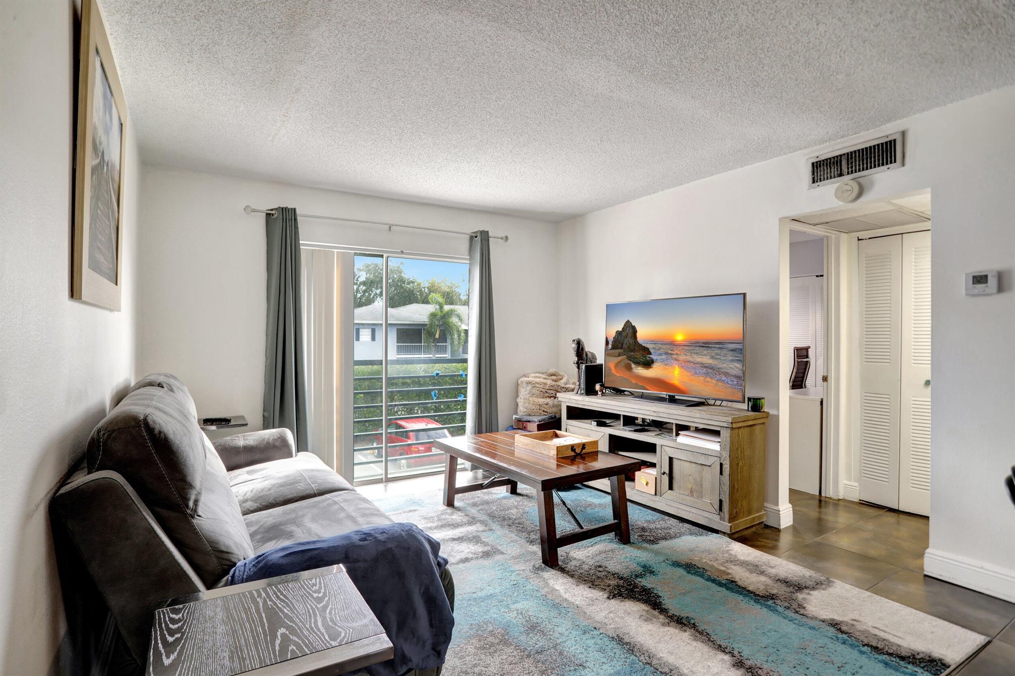 Also available for purchase. Cute 2 bed/1bath condo in the gated community of Embarcadero. The kitchen has modern kitchen cabinets with glass block base snack bar and stacked washer and dryer. Just a short drive to the beaches and close to the Florida Turnpike and the Fort Lauderdale International Airport. Dining and entertaining opportunities including restaurants, movies and the nightlife. Community amenities include, 24-hour security guarded entry gate, assigned off street parking, on-site property manager, 2 pools and 24 hour gym. Min 650 Credit score and $30,000 Annual Income.