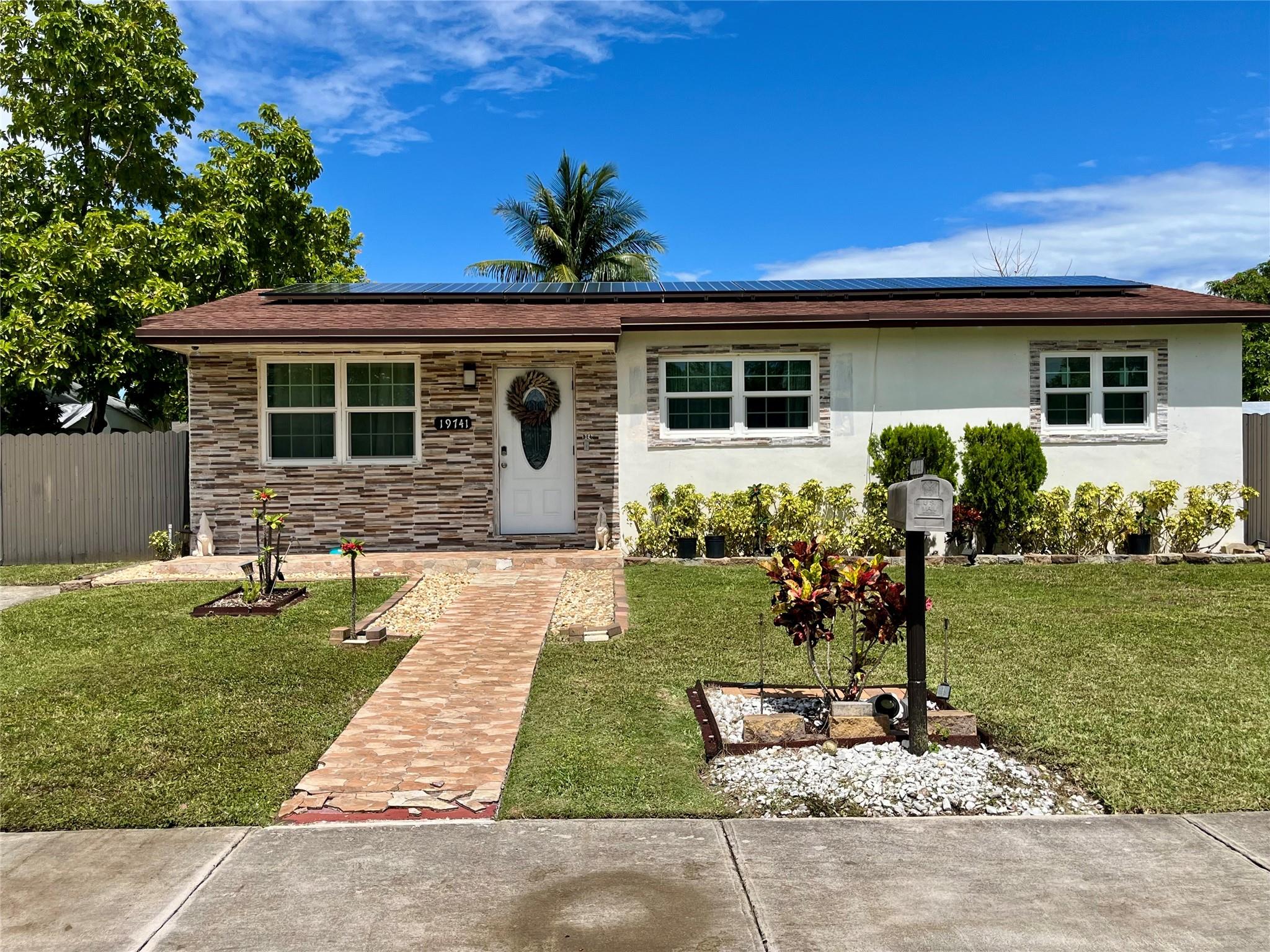 WELCOME HOME! This charming 4 bedroom, 2 bathroom home features a den and a flex room. With over 1,800 square feet, this home is perfect for first-time home buyers or a growing family. Nice sized backyard with an ackee tree, fully fenced and perfect for entertaining or parking your RV. Enjoy a peace of mind with impact windows, updated electrical panel, A/C, plus energy-saving solar panels and a roof that is only 3 years old!! Don't miss this opportunity as this home is priced to sell! Near shopping malls, major expressways and the Florida Turnpike.
