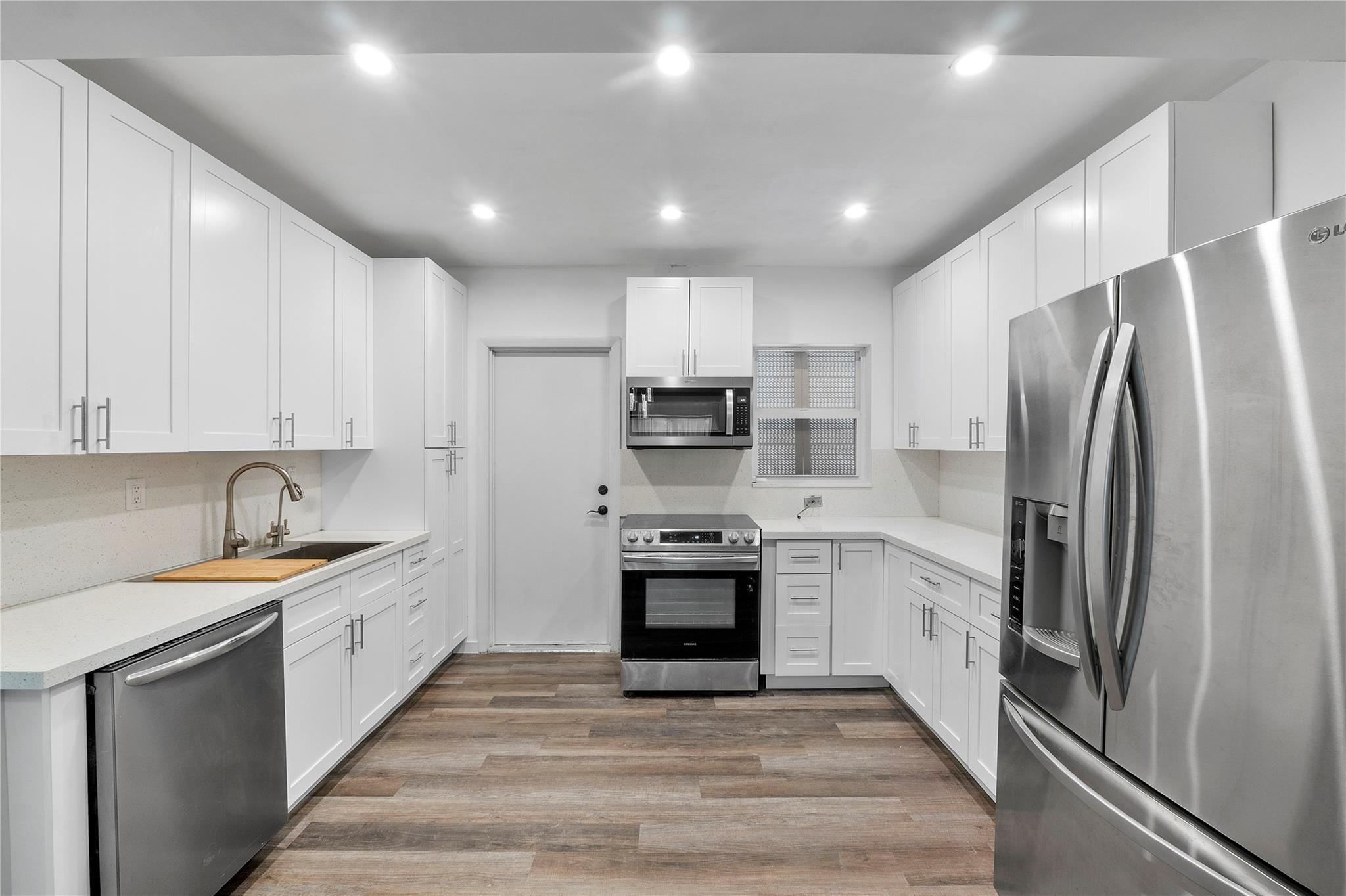 Bright, upgraded, and move-in ready! This spacious 2BD 2BA condo in 55+ Plantation Terrace has been beautifully remodeled for optimal comfort, and features a large split floor plan with impact windows, brand new custom white shaker kitchen with quartz counters, new stainless steel appliances, and upgraded bathrooms with custom walk-in showers. Primary bedroom offers two closets (including a walk-in closet) and direct balcony access with garden views. Unit includes a huge garage-sized storage unit and assigned covered parking, making it truly perfect for downsizing or embracing low-maintenance living. Enjoy lush grounds, pool, BBQ area, community room, and walking paths, and just minutes to shopping, dining, Riverside Market, Broward Mall, highways, and beaches. No rentals allowed per HOA.