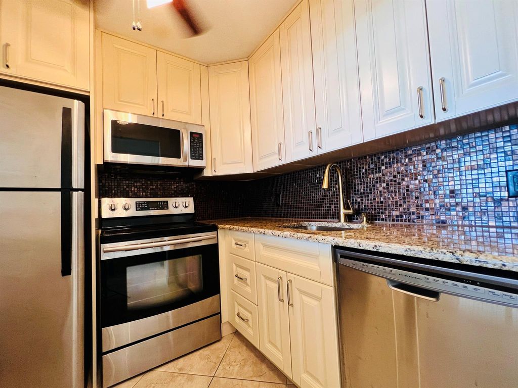 Photo of 10 Kent A, West Palm Beach, FL 33417 (MLS # R11132610)