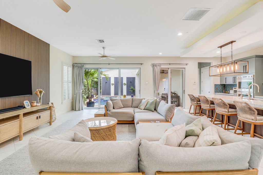 Photo of 5021 Grandiflora Road, Palm Beach Gardens, FL 33418 (MLS # R11105689)